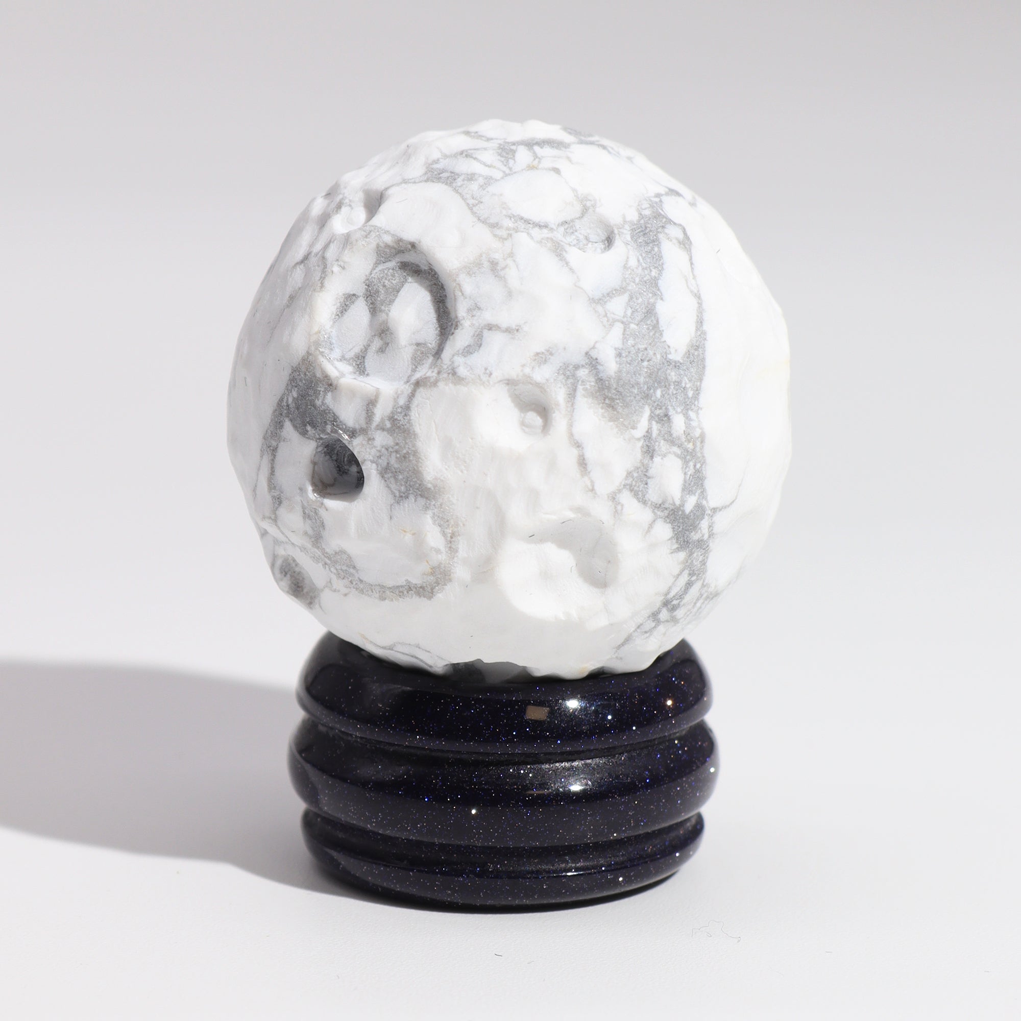 white-howlite-planet-on-a-solar-goldstone-stand-moon